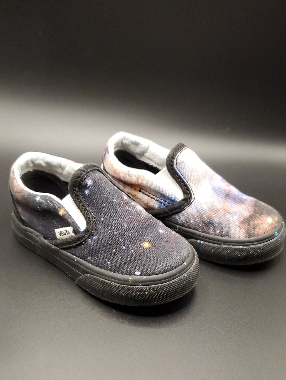 Vans Kids Slip-On Sneakers in Galaxy Black and Navy